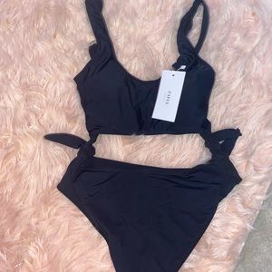 Black one piece! Brand new with tags!
